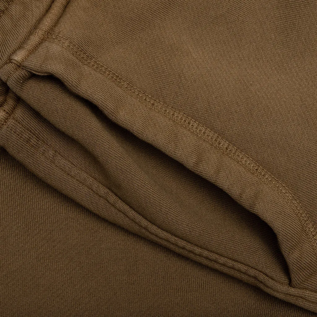 Brown sweatshorts.