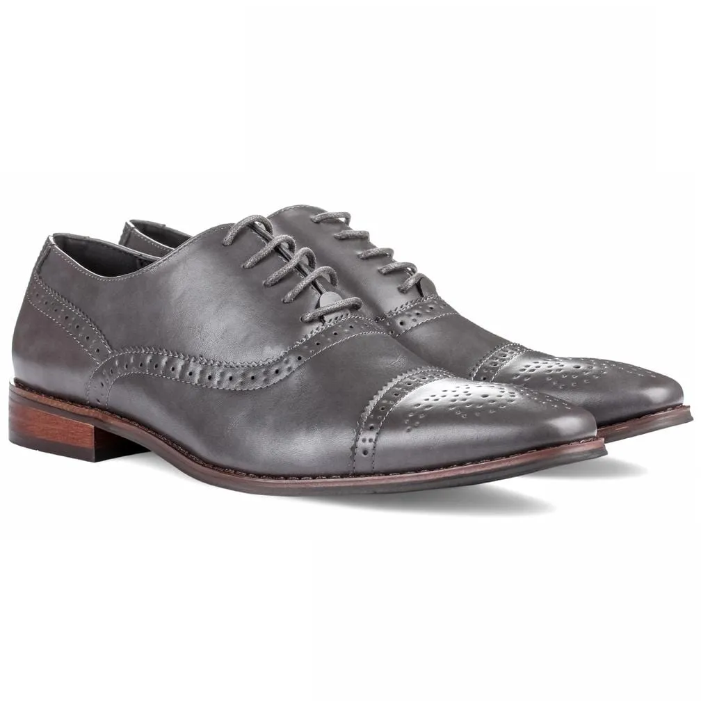 Men's brogue cap toe dress shoes.